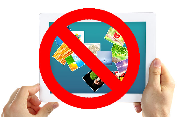 Hands holding tablet PC with different pictures